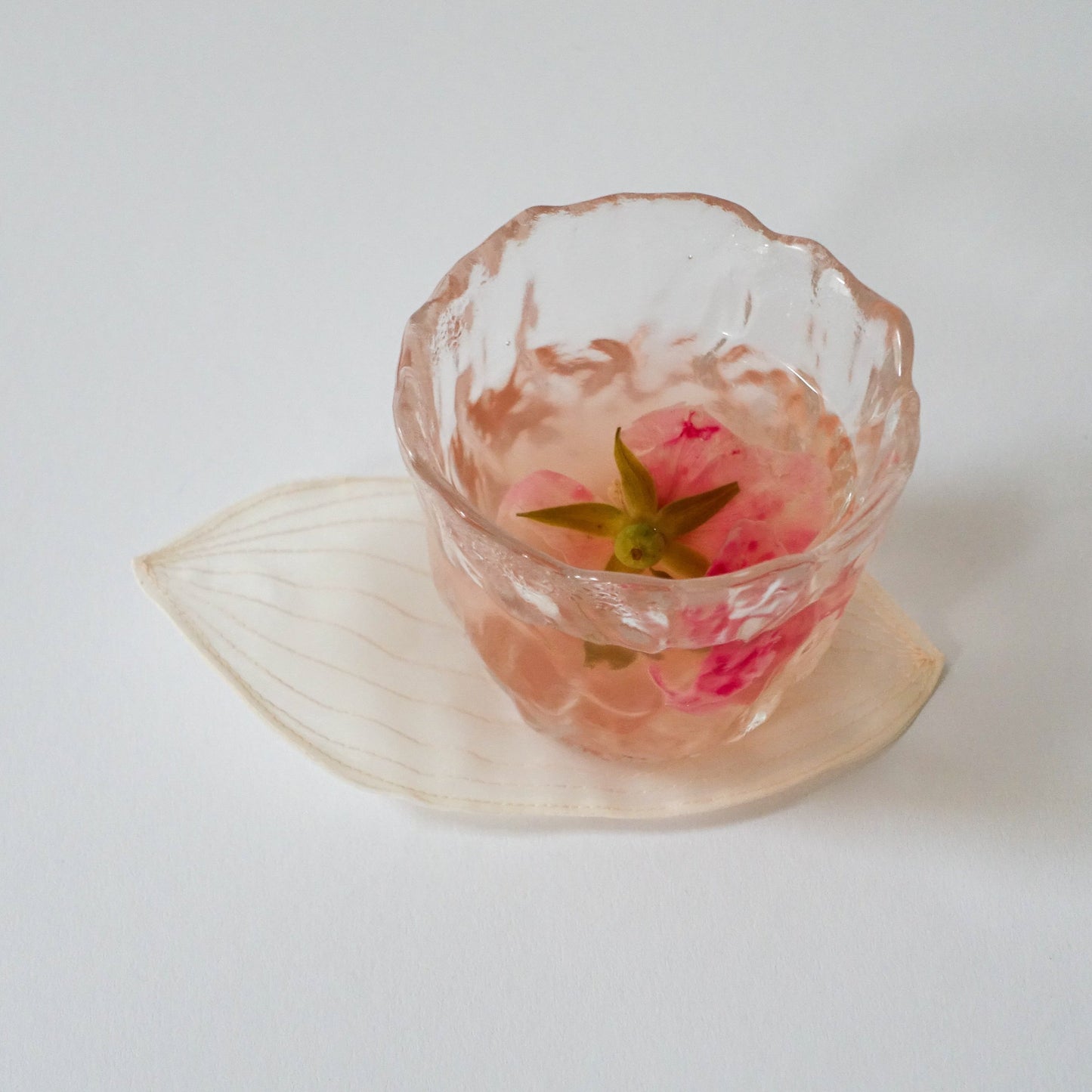 Gesteppter Nubi-Untersetzer in Lotusblattform